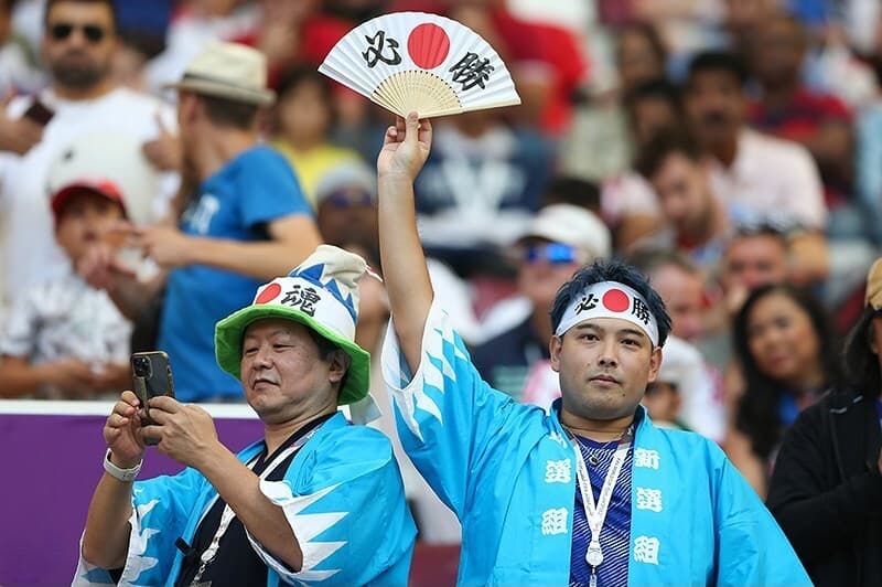 Japan celebrate beating Germany at the 2022 World Cup